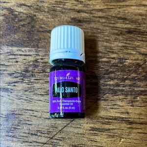 Young Living Palo Santo Oil in Purple and Black